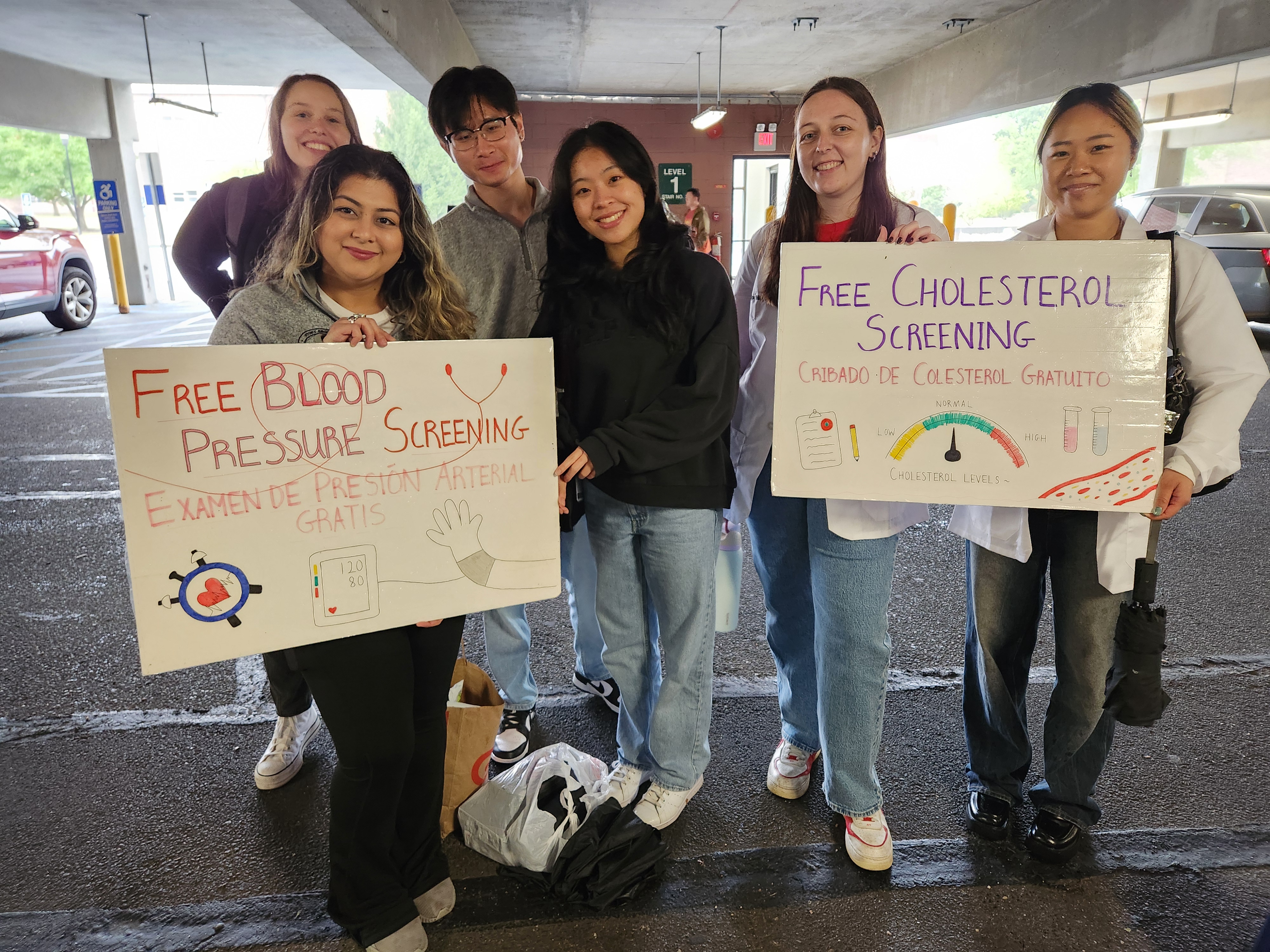 PA students holding signs for CommUniversity Day 2024